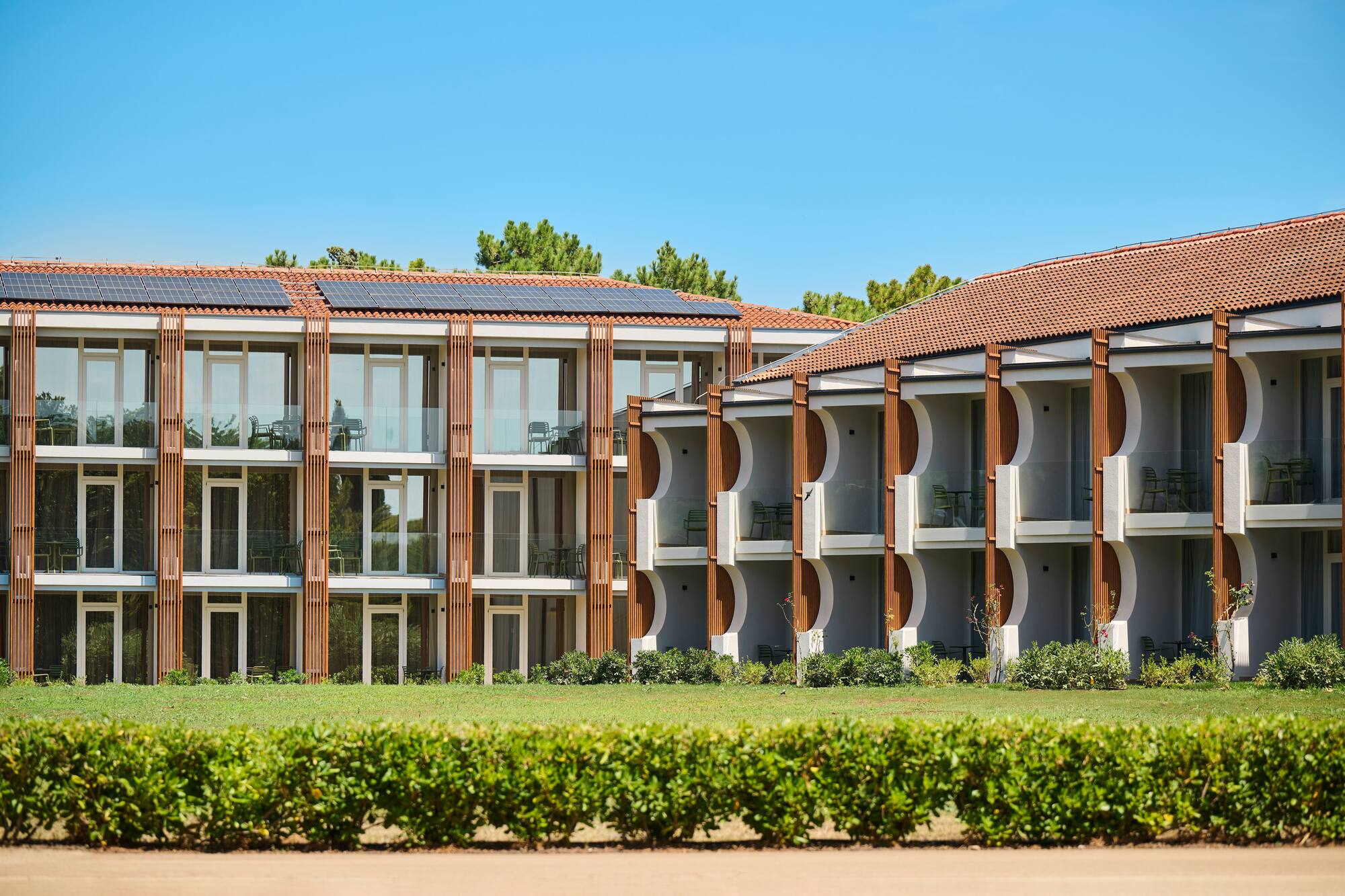 a building with a green lawn