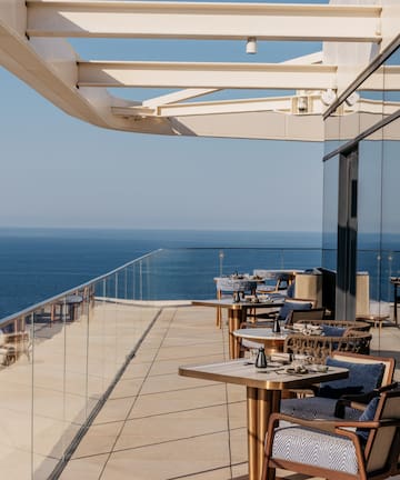 a restaurant overlooking the ocean