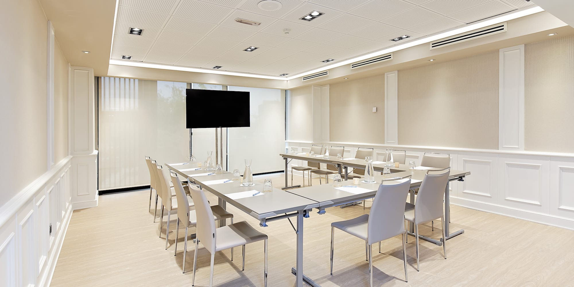 a room with a table and chairs