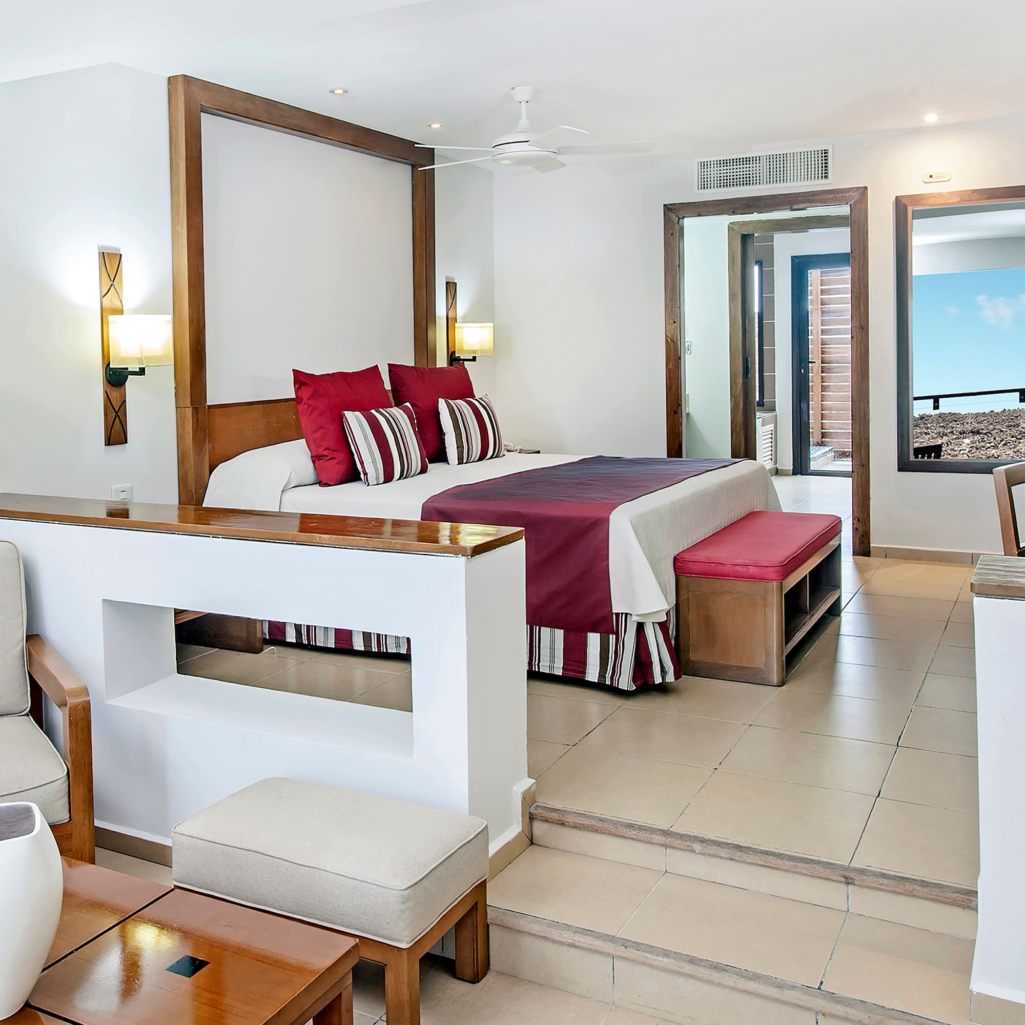 a bedroom with a bed and a couch