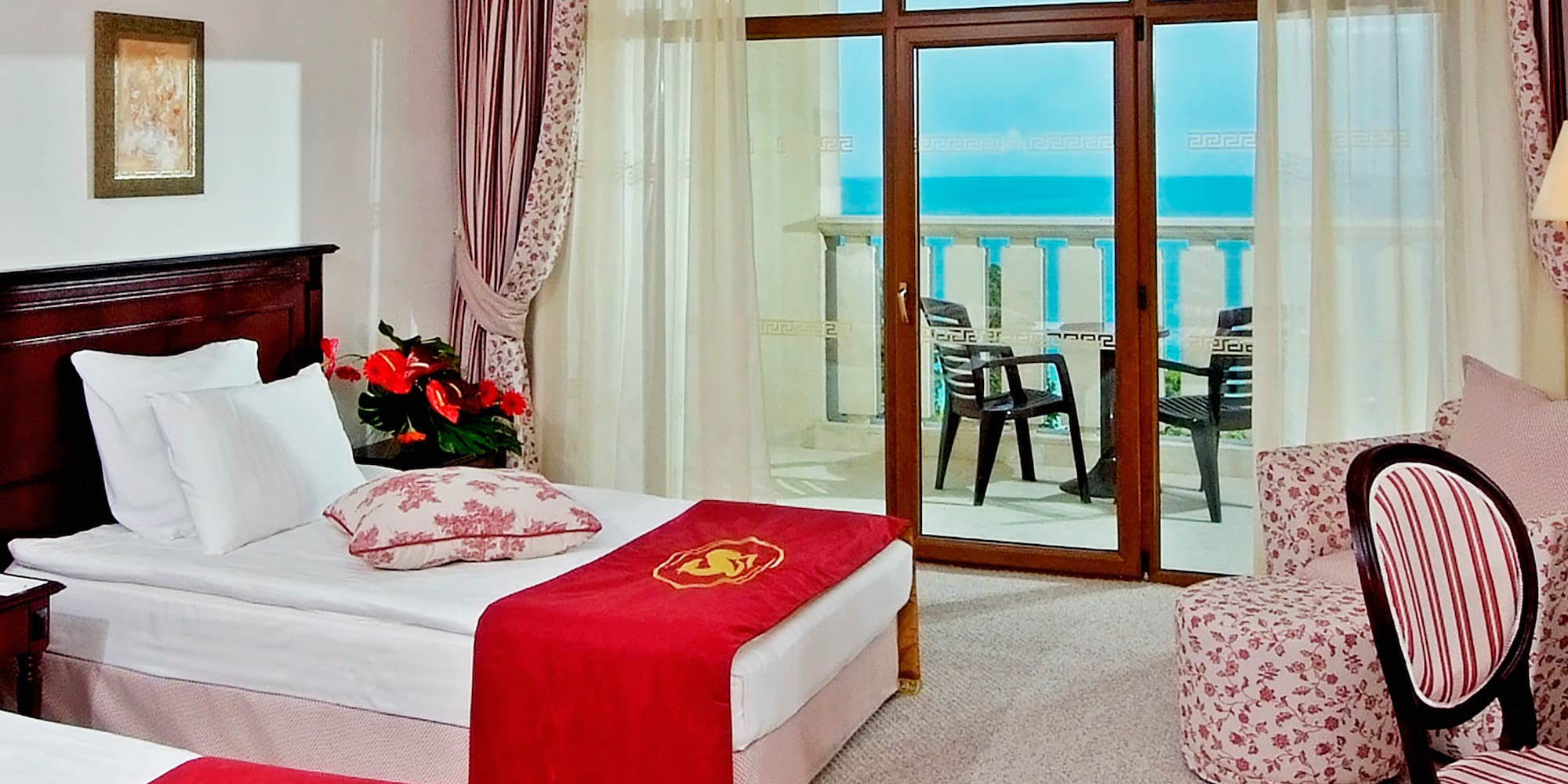 a room with two beds and a window