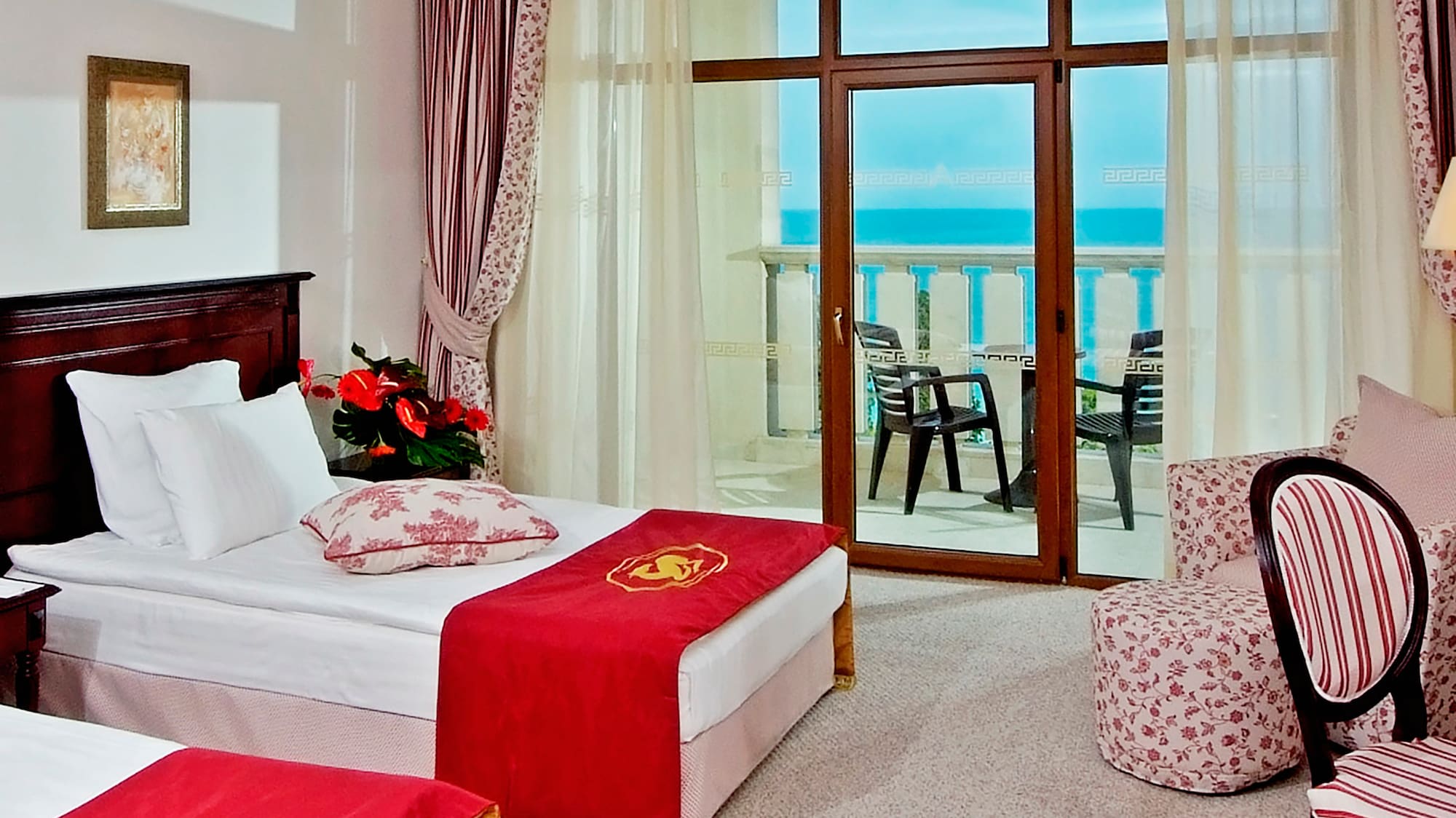 a room with two beds and a window