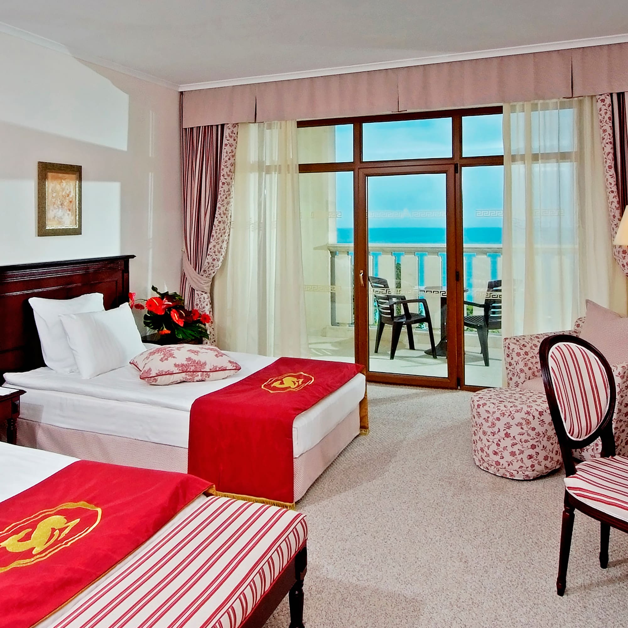 a room with two beds and a window