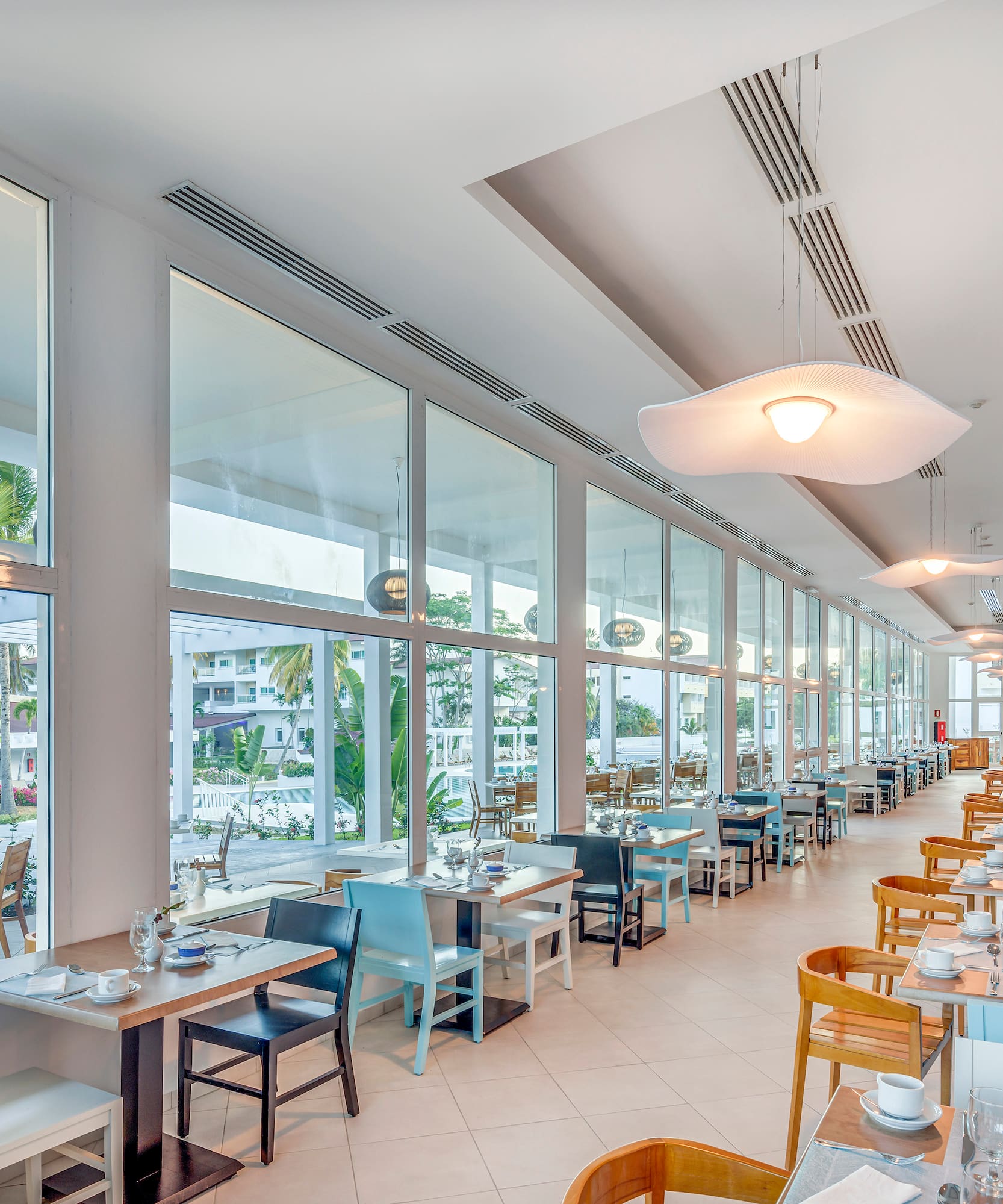 a restaurant with tables and chairs