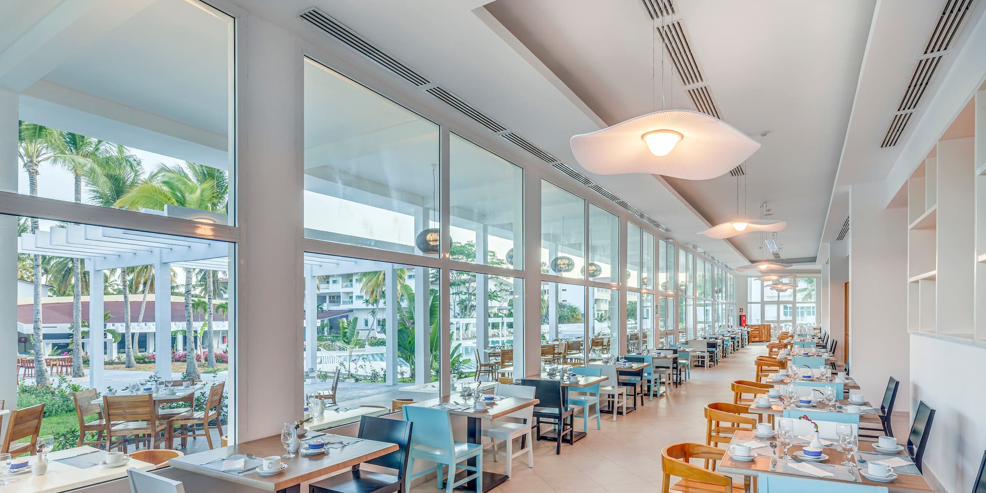 a restaurant with tables and chairs