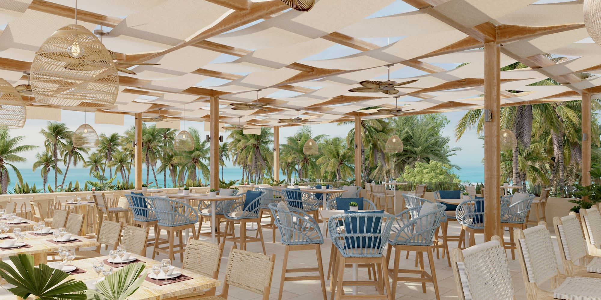 Shaded tropical restaurant patio with ocean view and palm trees.