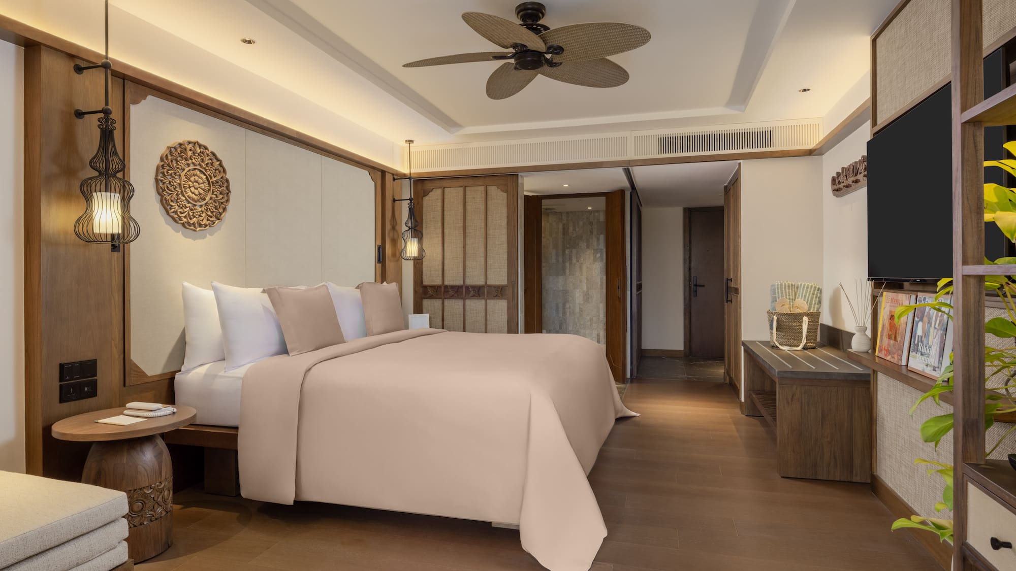 a bedroom with a television and a bed