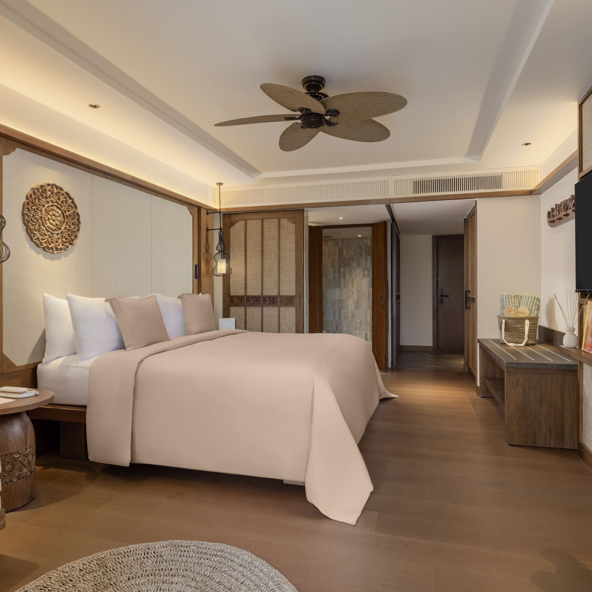 a bedroom with a television and a bed