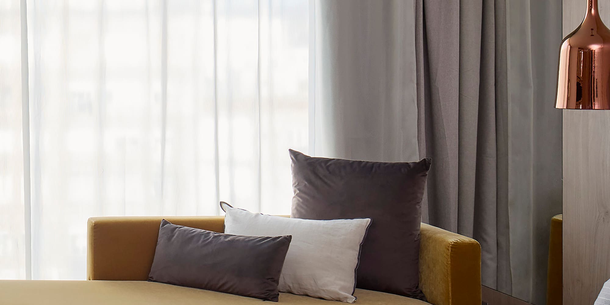 a bed and couch in a room