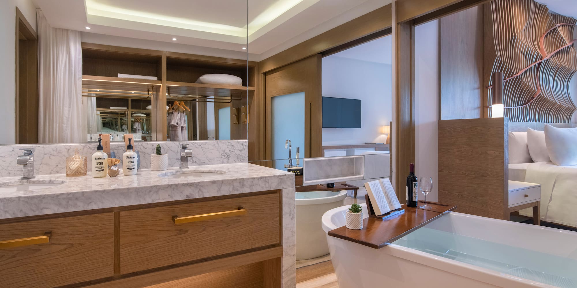 a bathroom with a tub and a mirror