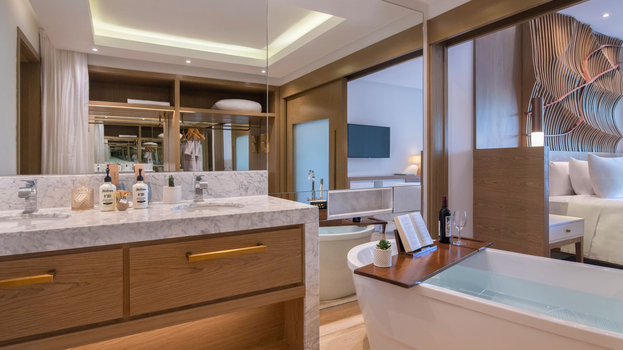 a bathroom with a tub and a mirror