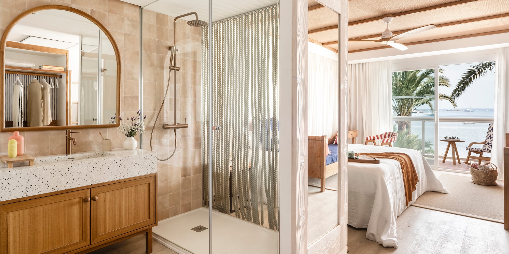 a bathroom with a shower and a bed