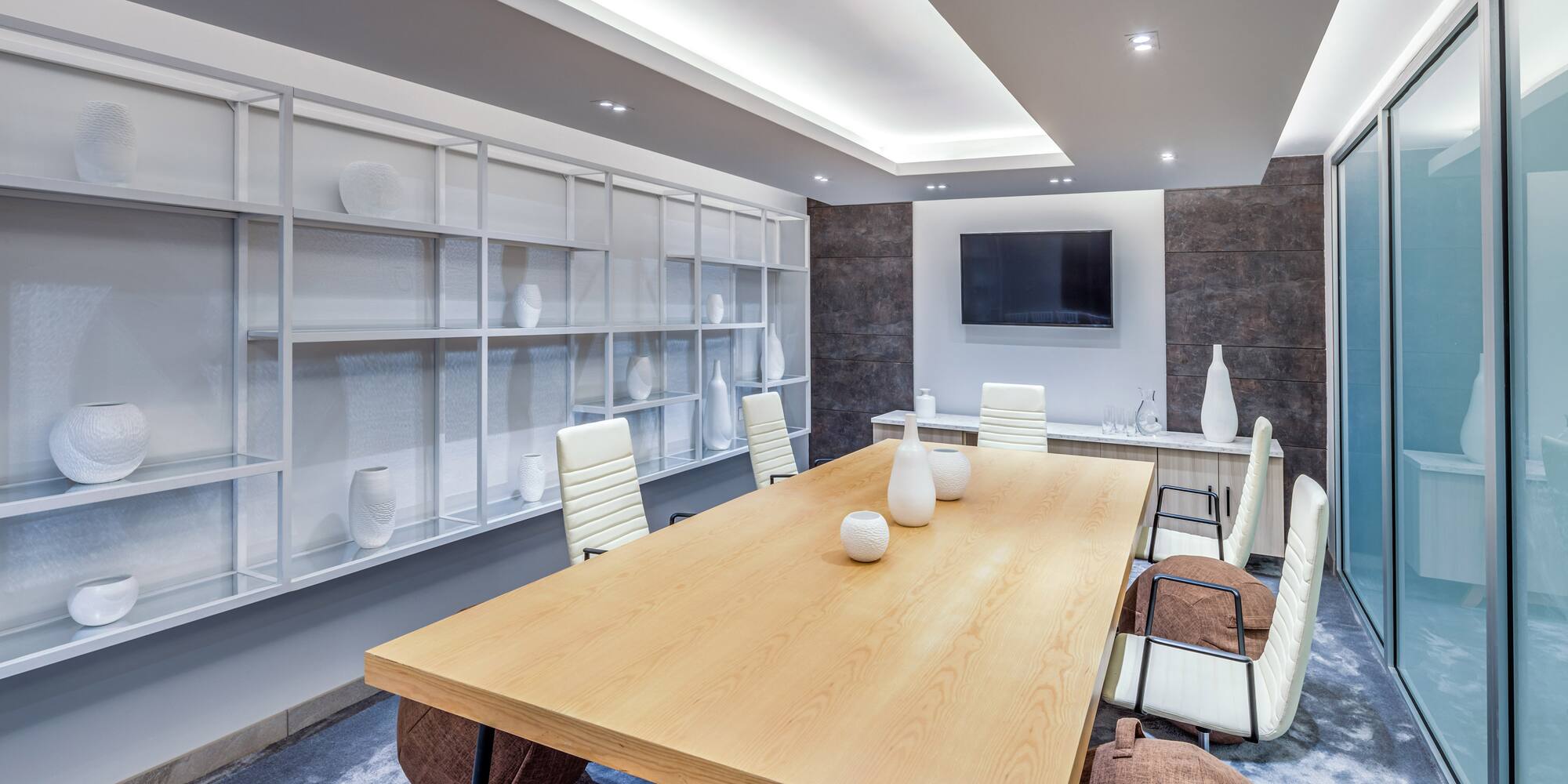 a room with a table and chairs