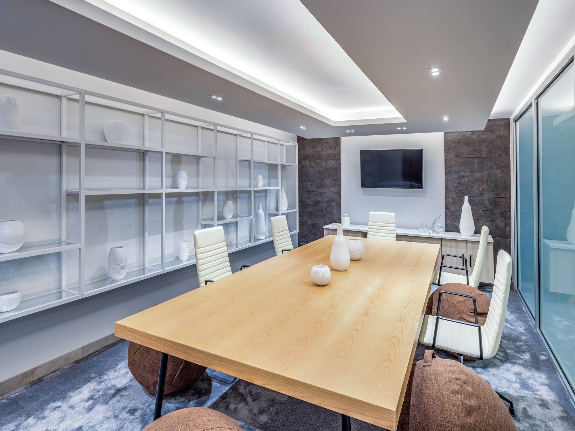 a room with a table and chairs