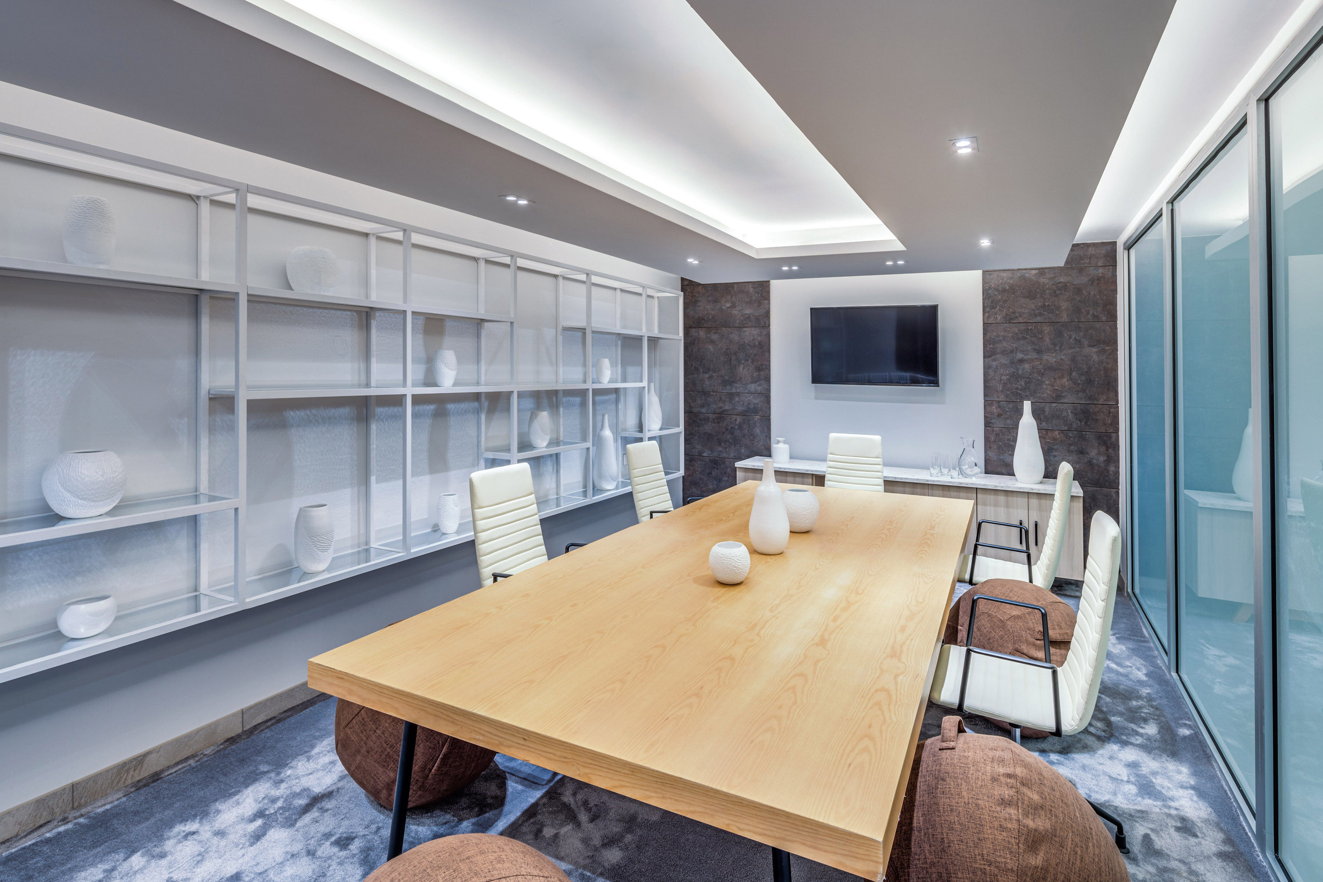 a room with a table and chairs