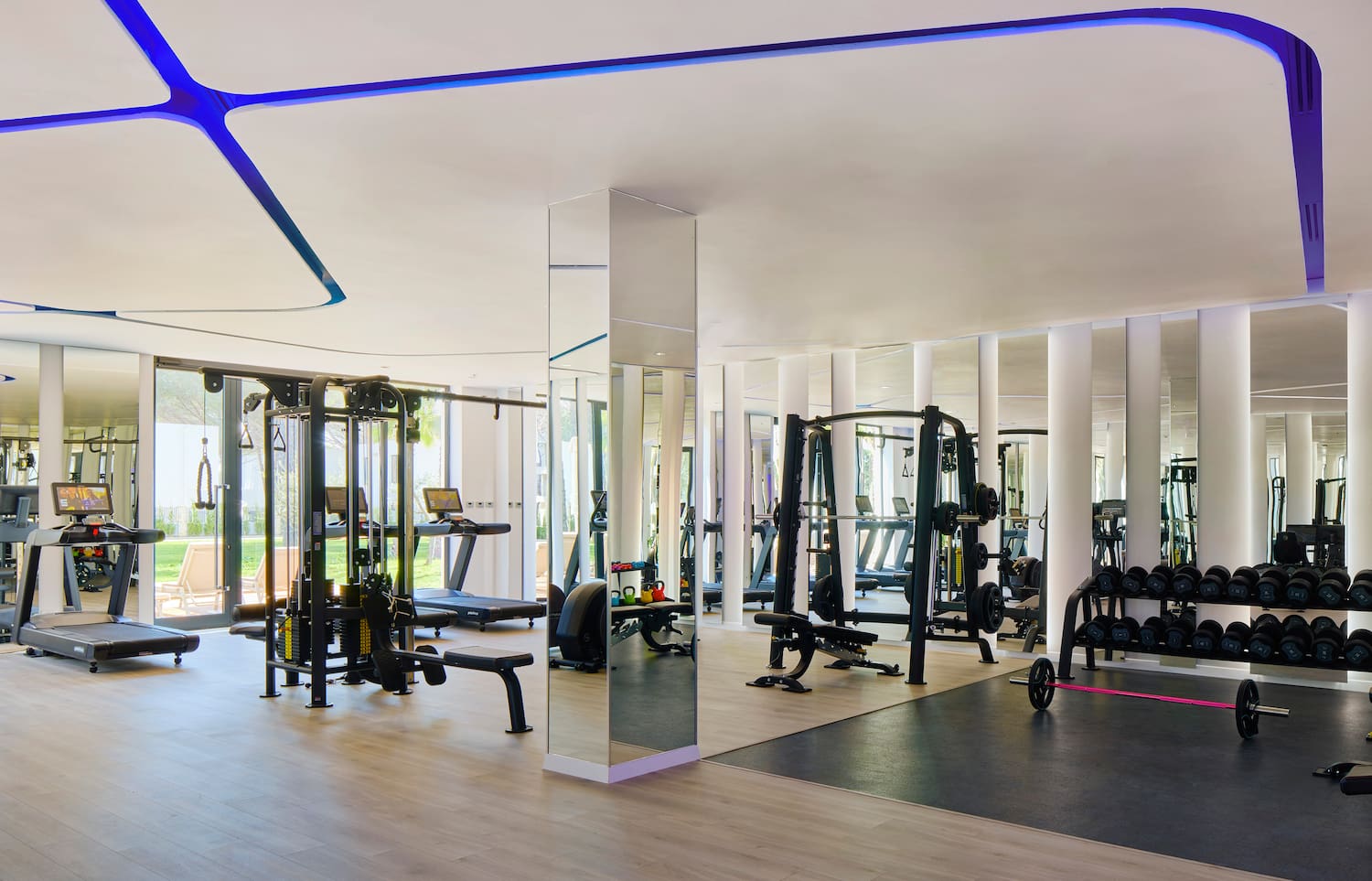 a large room with gym equipment