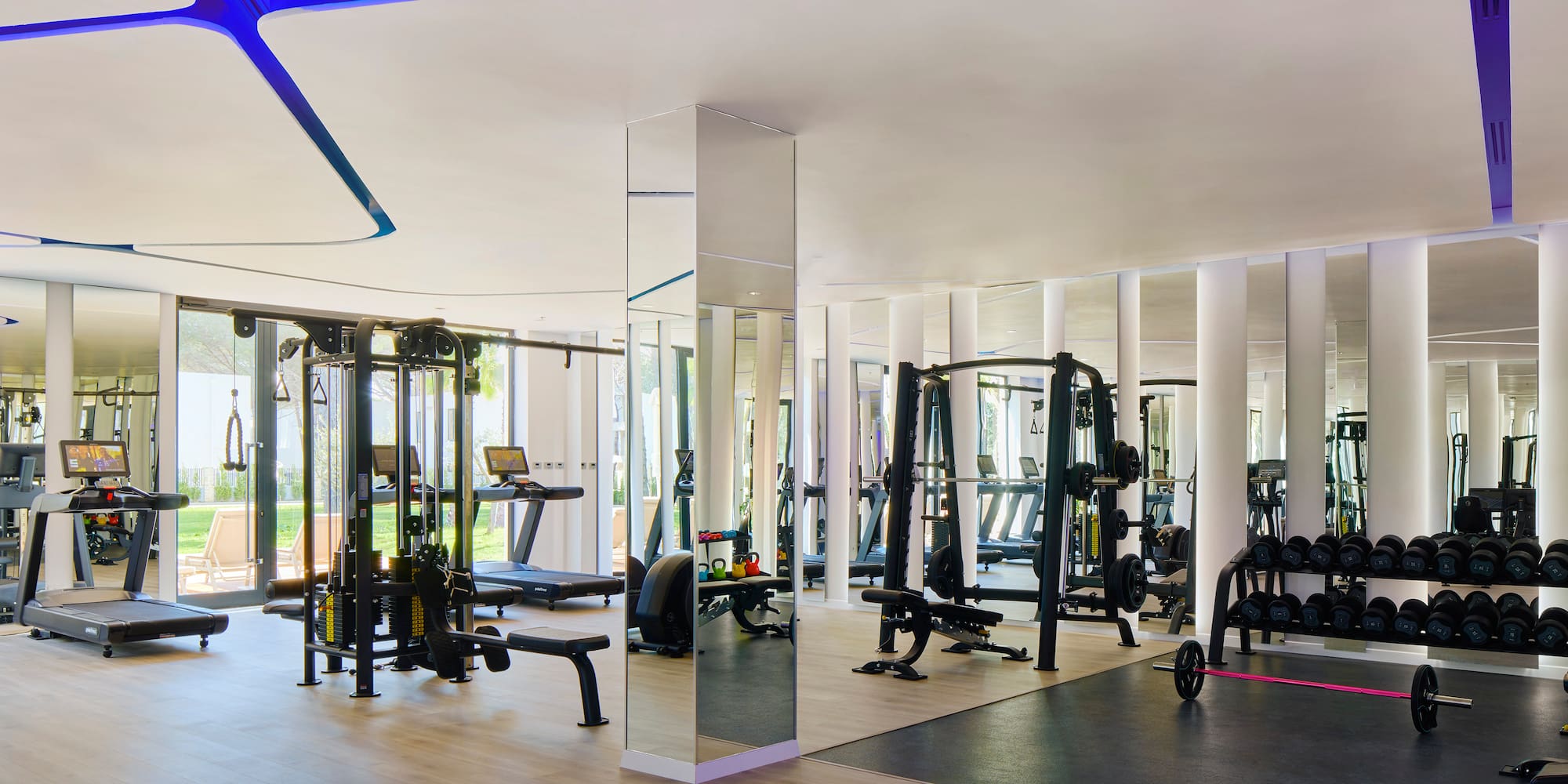 a large room with gym equipment