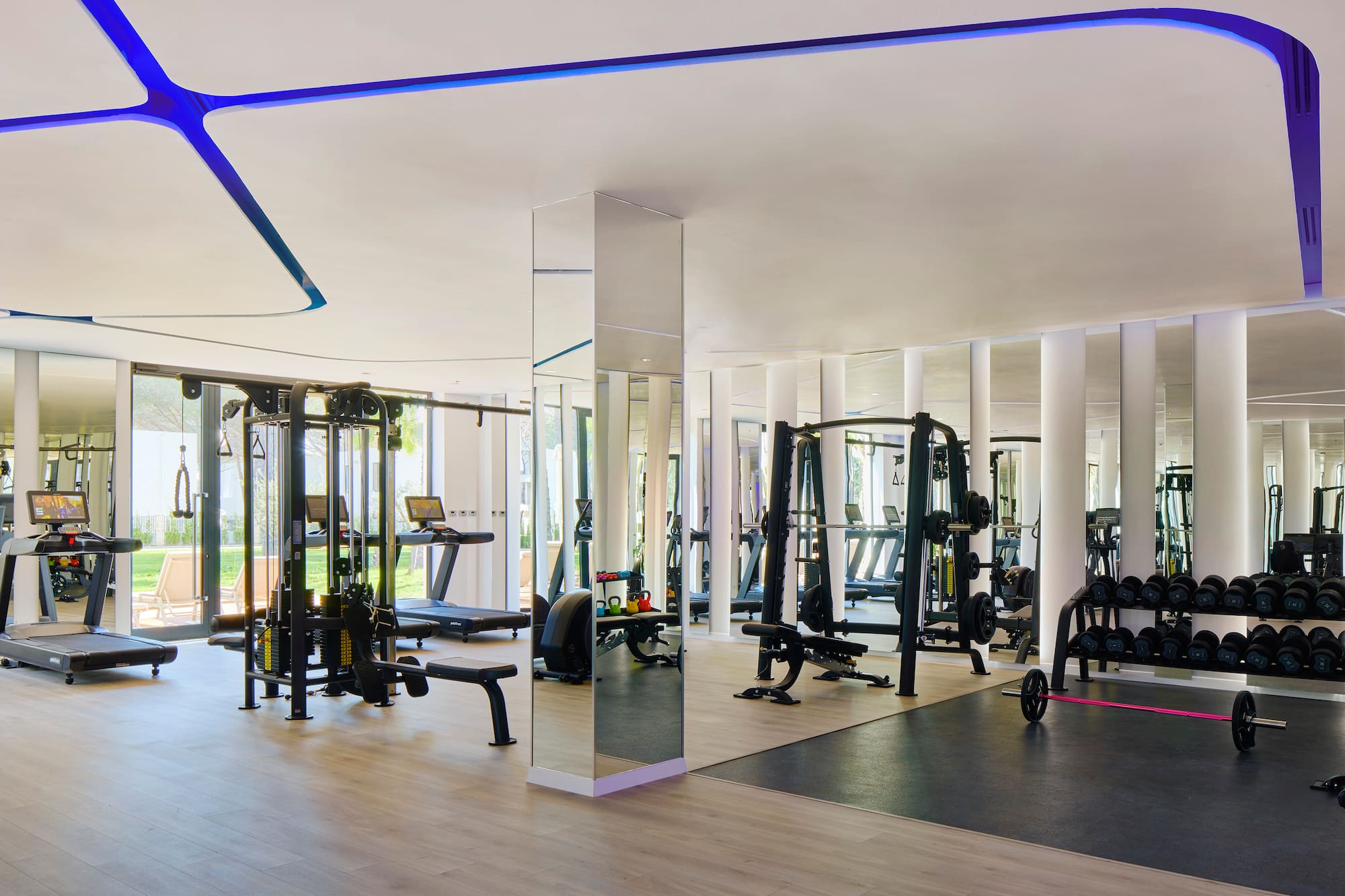 a large room with gym equipment