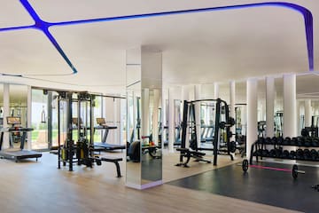 a large room with gym equipment