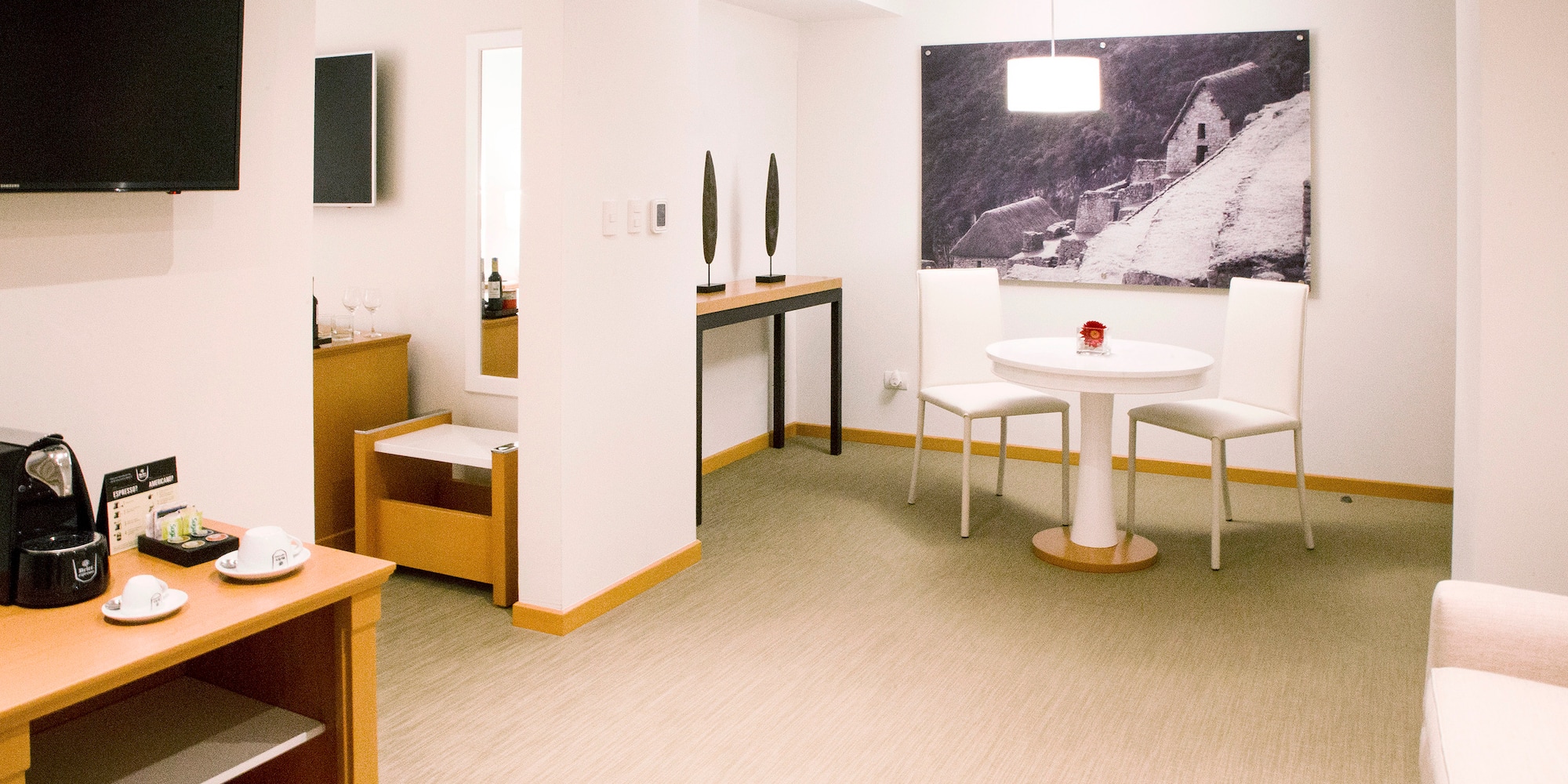 a room with a table and chairs