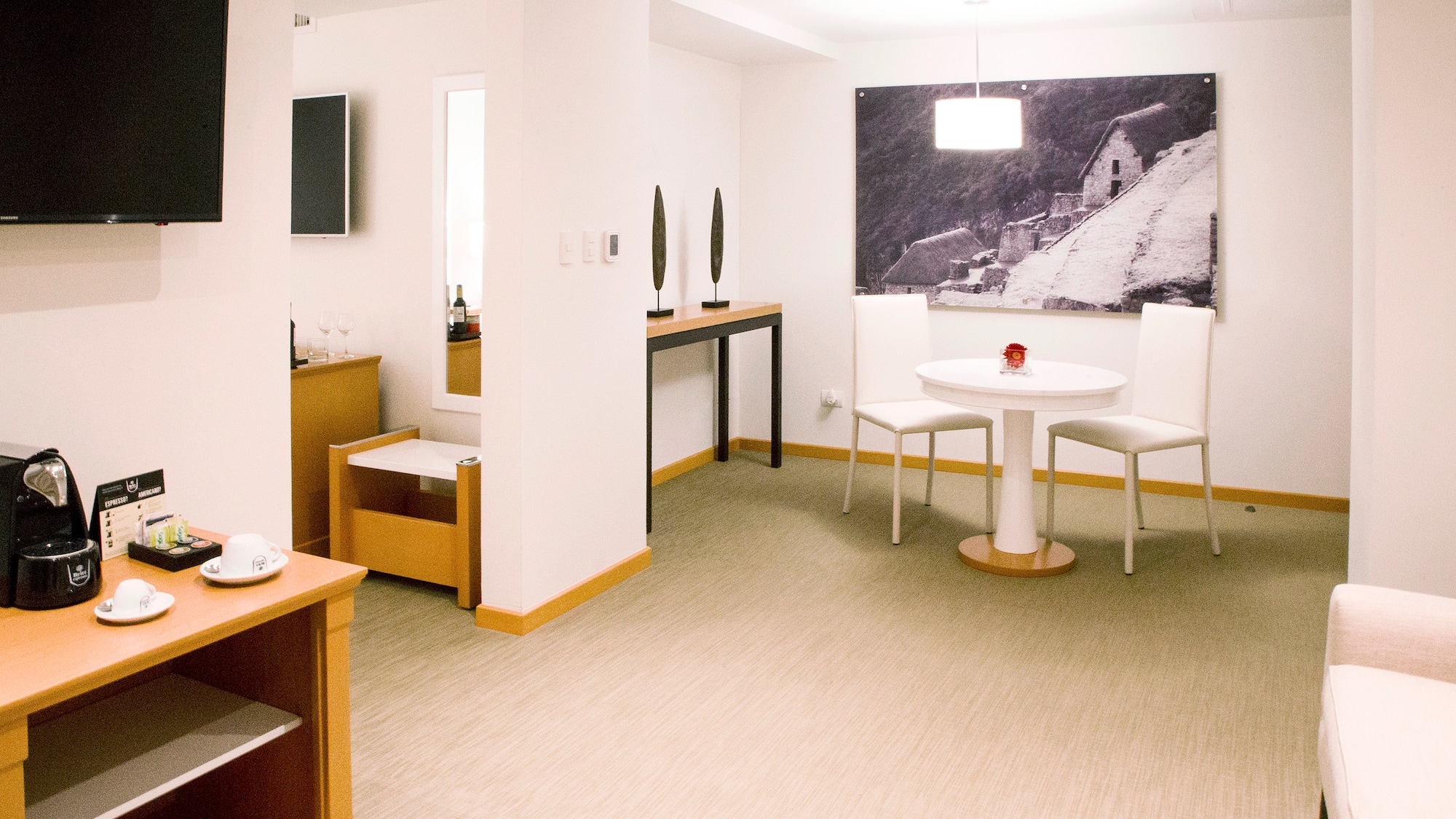 a room with a table and chairs