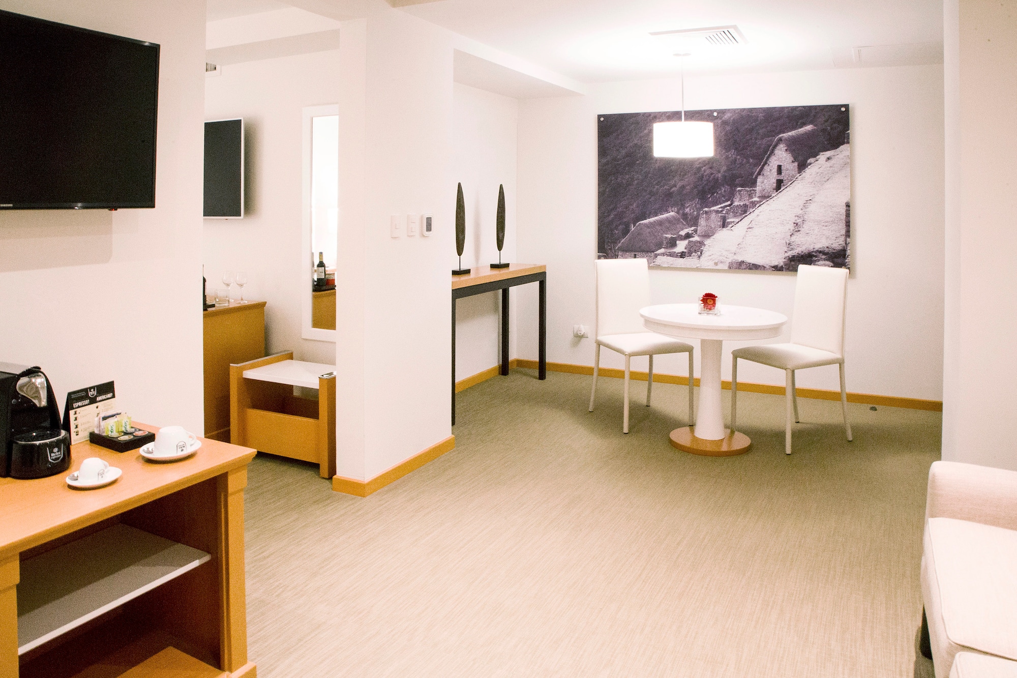 a room with a table and chairs