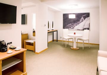 a room with a table and chairs