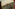 View of a Mediterranean town and red-domed church through abstract framing.