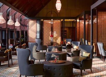 a room with tables and chairs