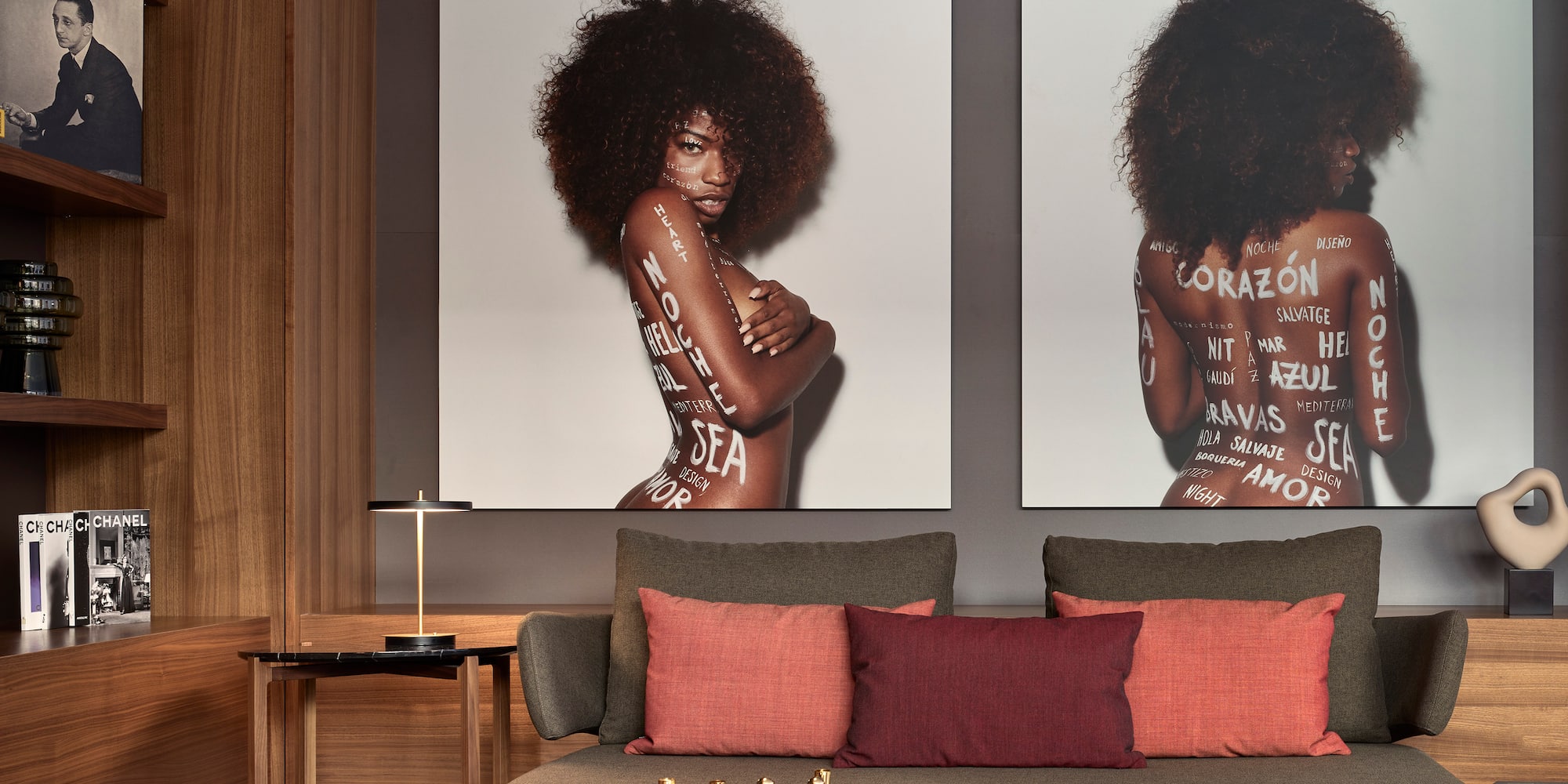 a woman with afro hair and a large picture of a woman