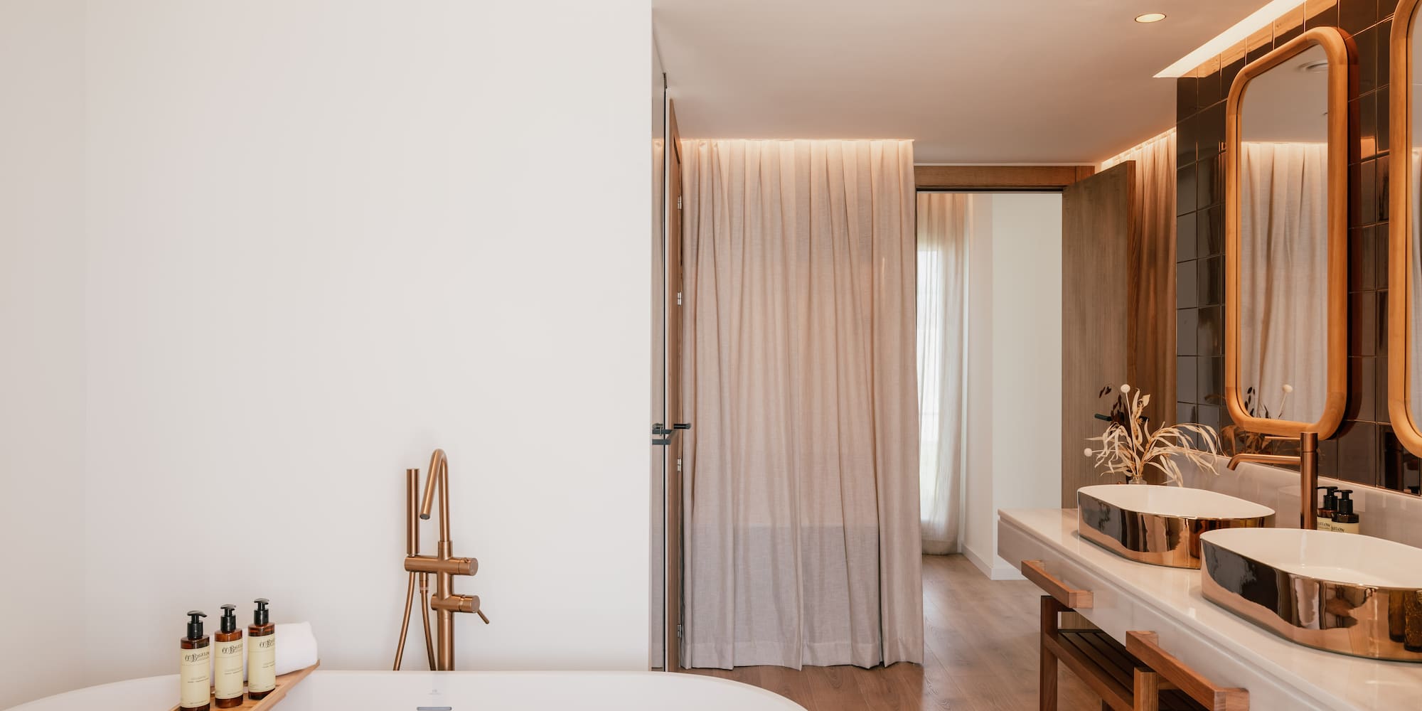 a bathroom with a tub and sink