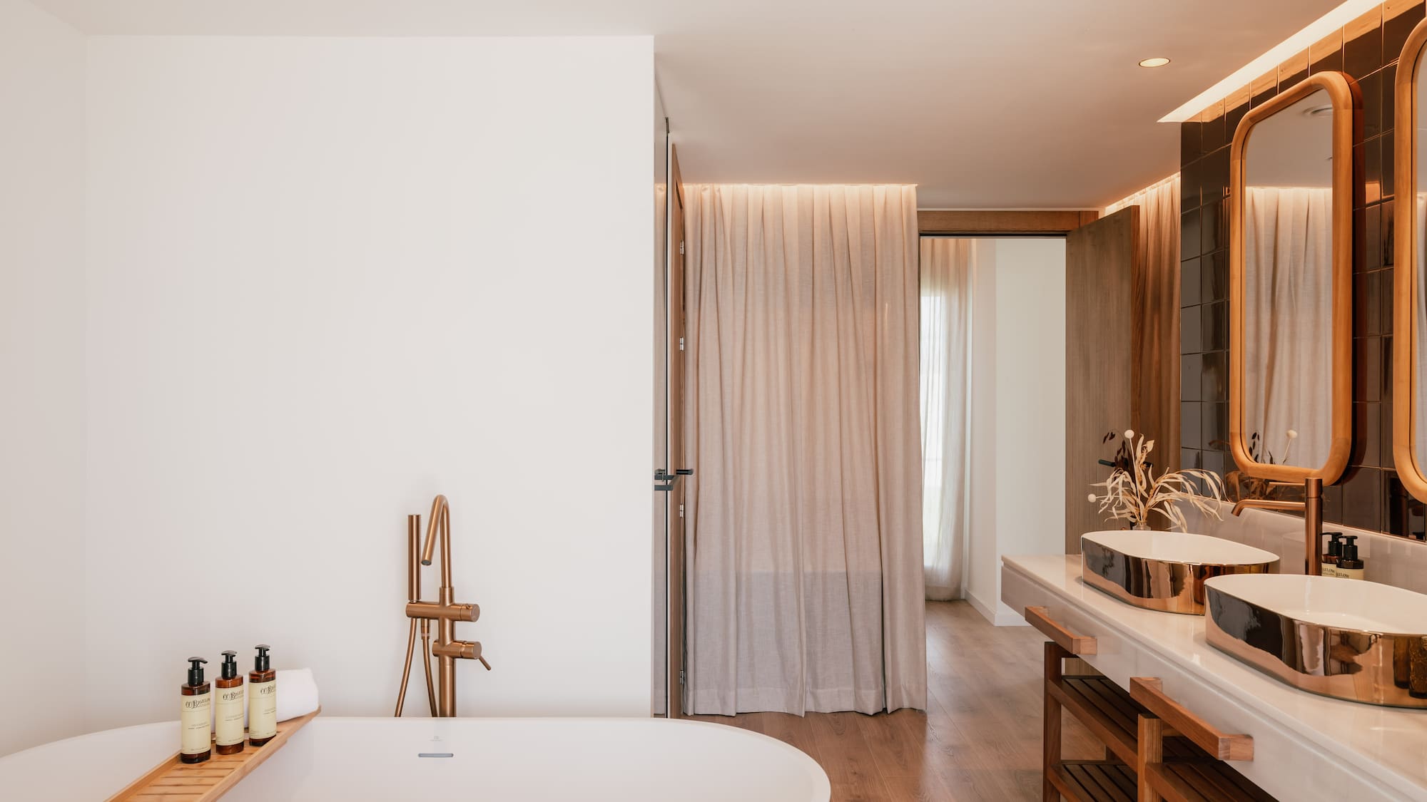 a bathroom with a tub and sink