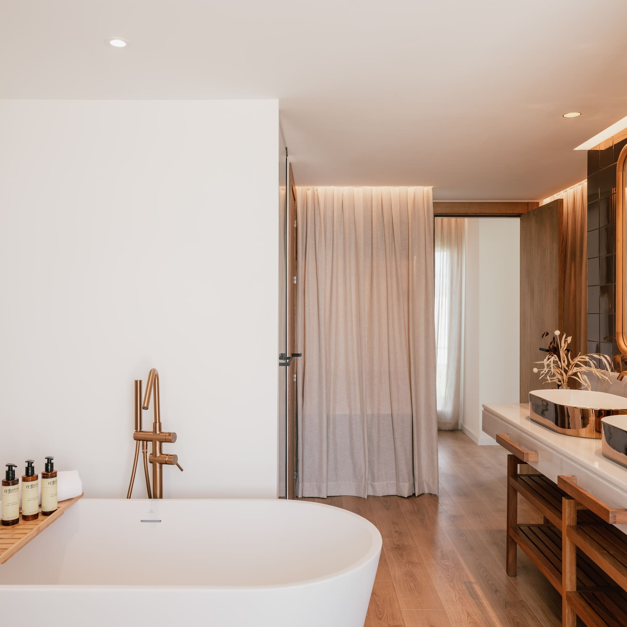 a bathroom with a tub and sink