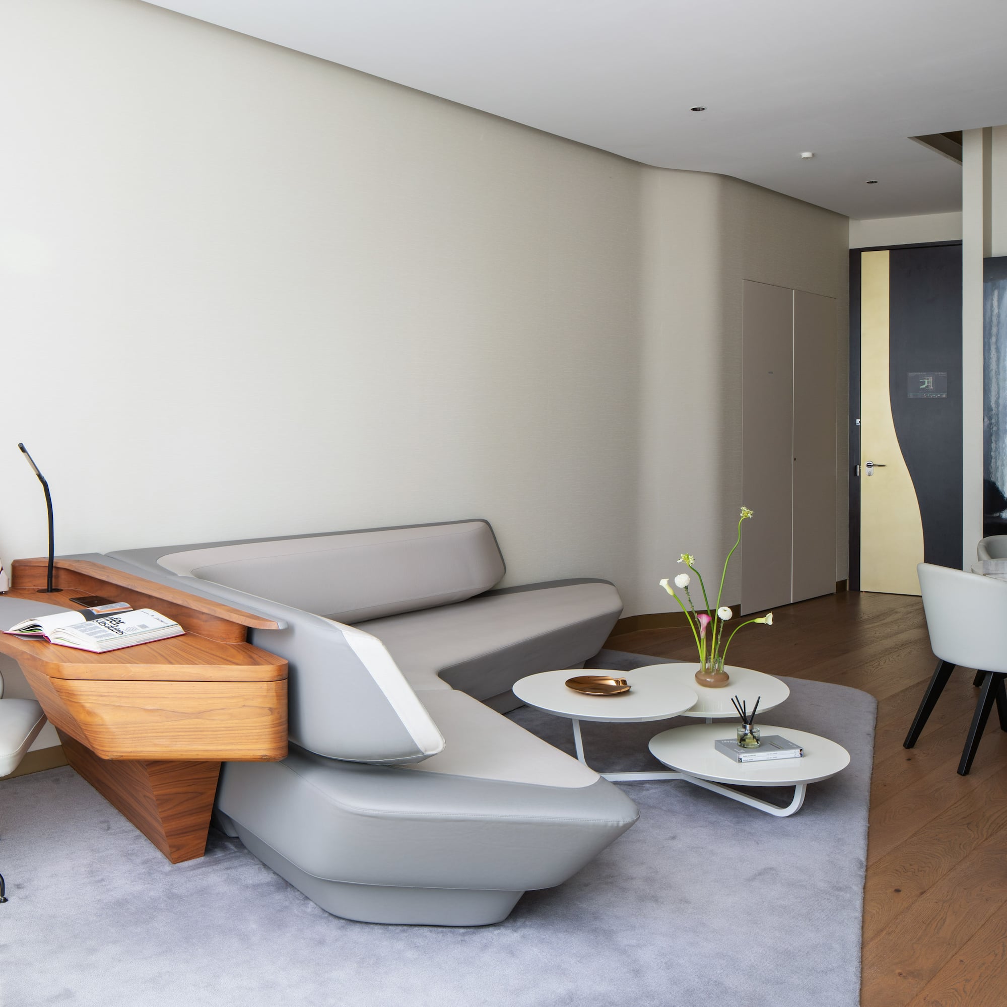 a living room with a couch and a table