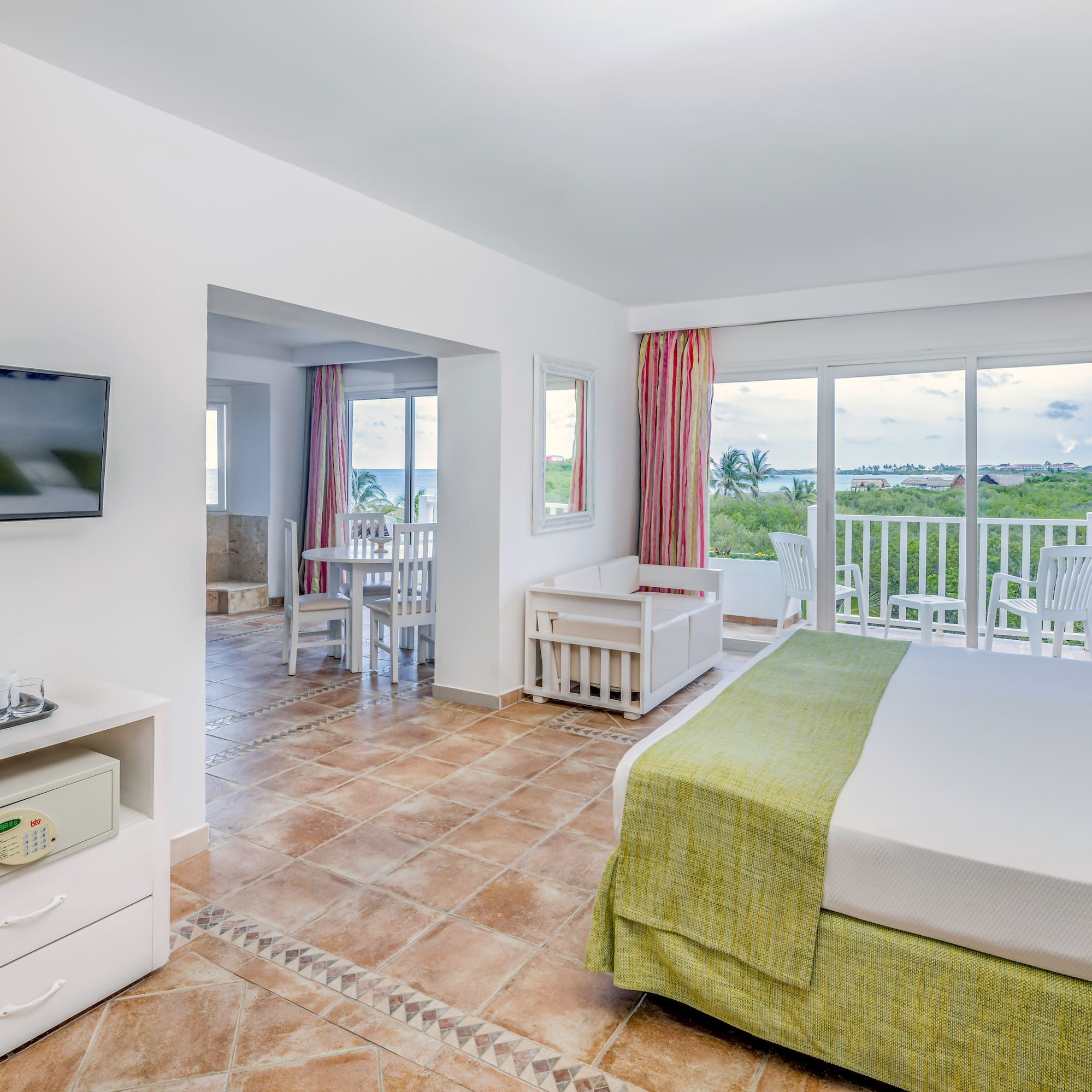 a room with a television and a bed