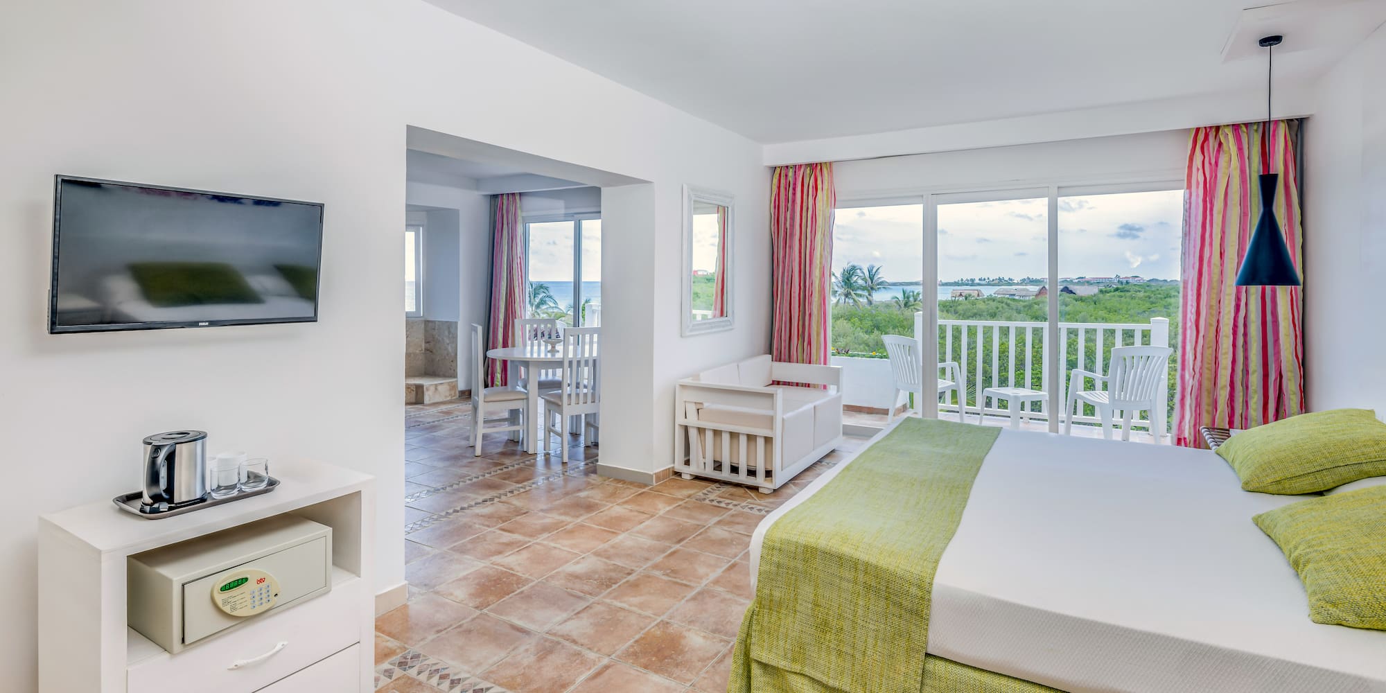 a room with a television and a bed