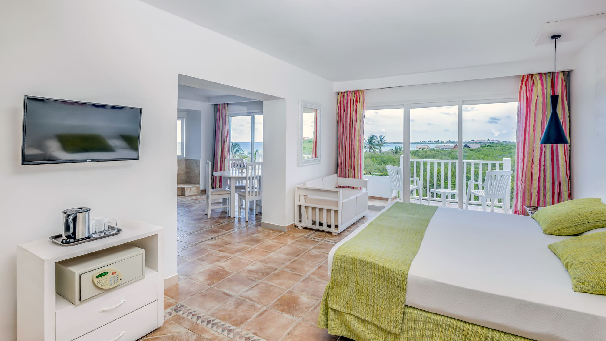 a room with a television and a bed