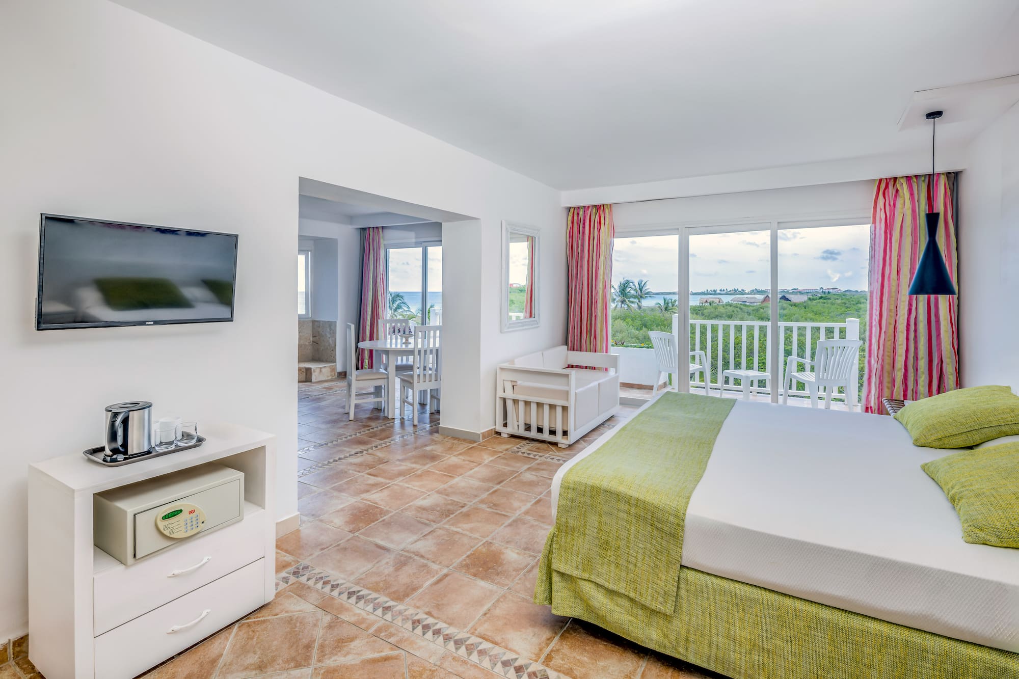 a room with a television and a bed