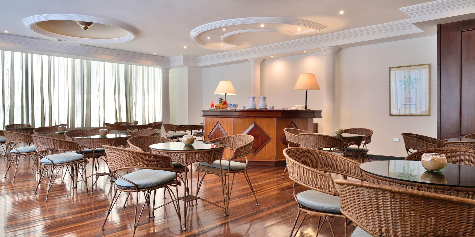 a room with tables and chairs