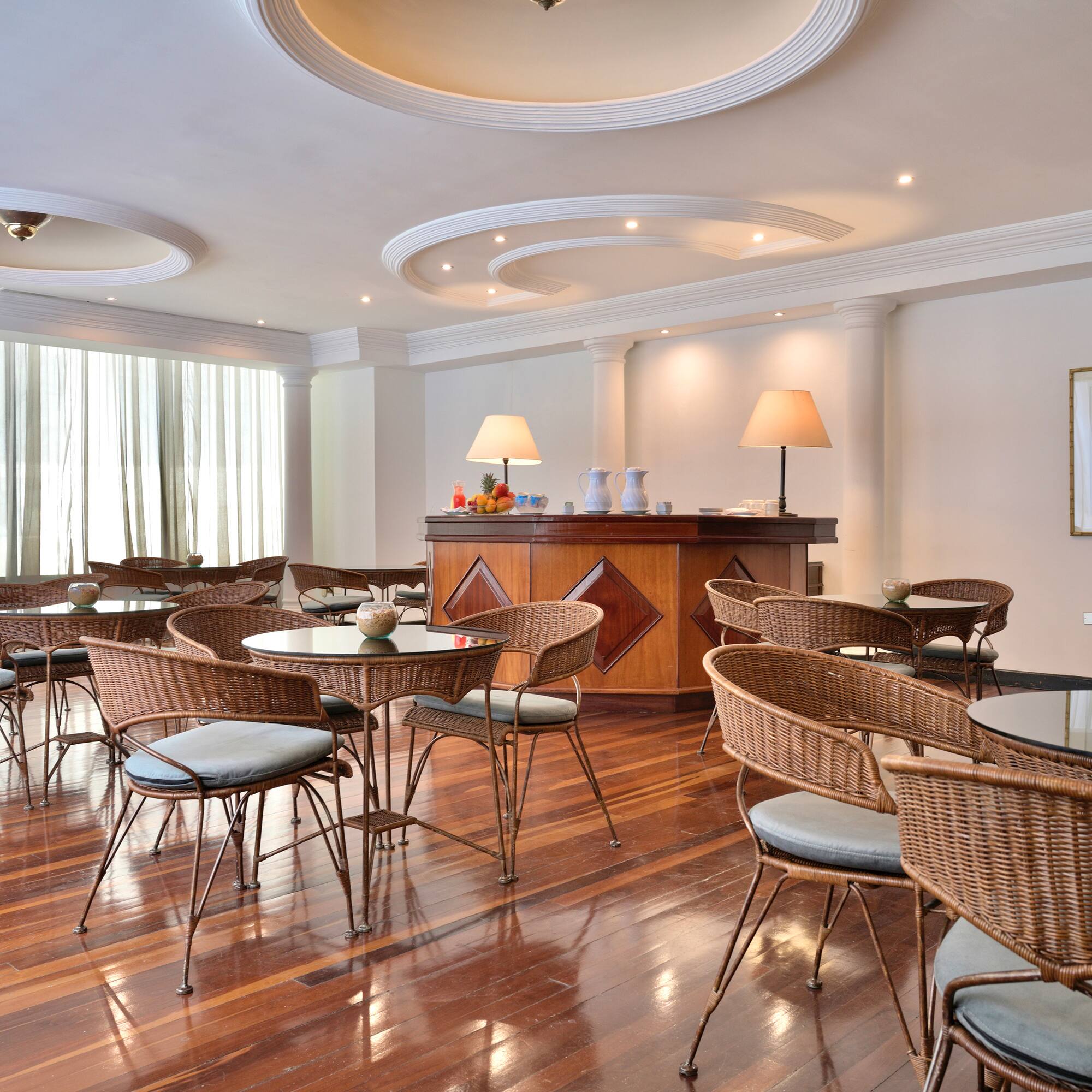 a room with tables and chairs