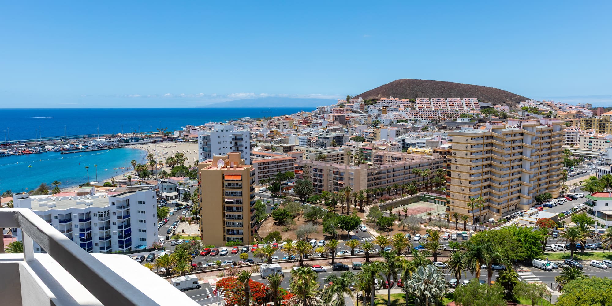 a city with a beach and trees