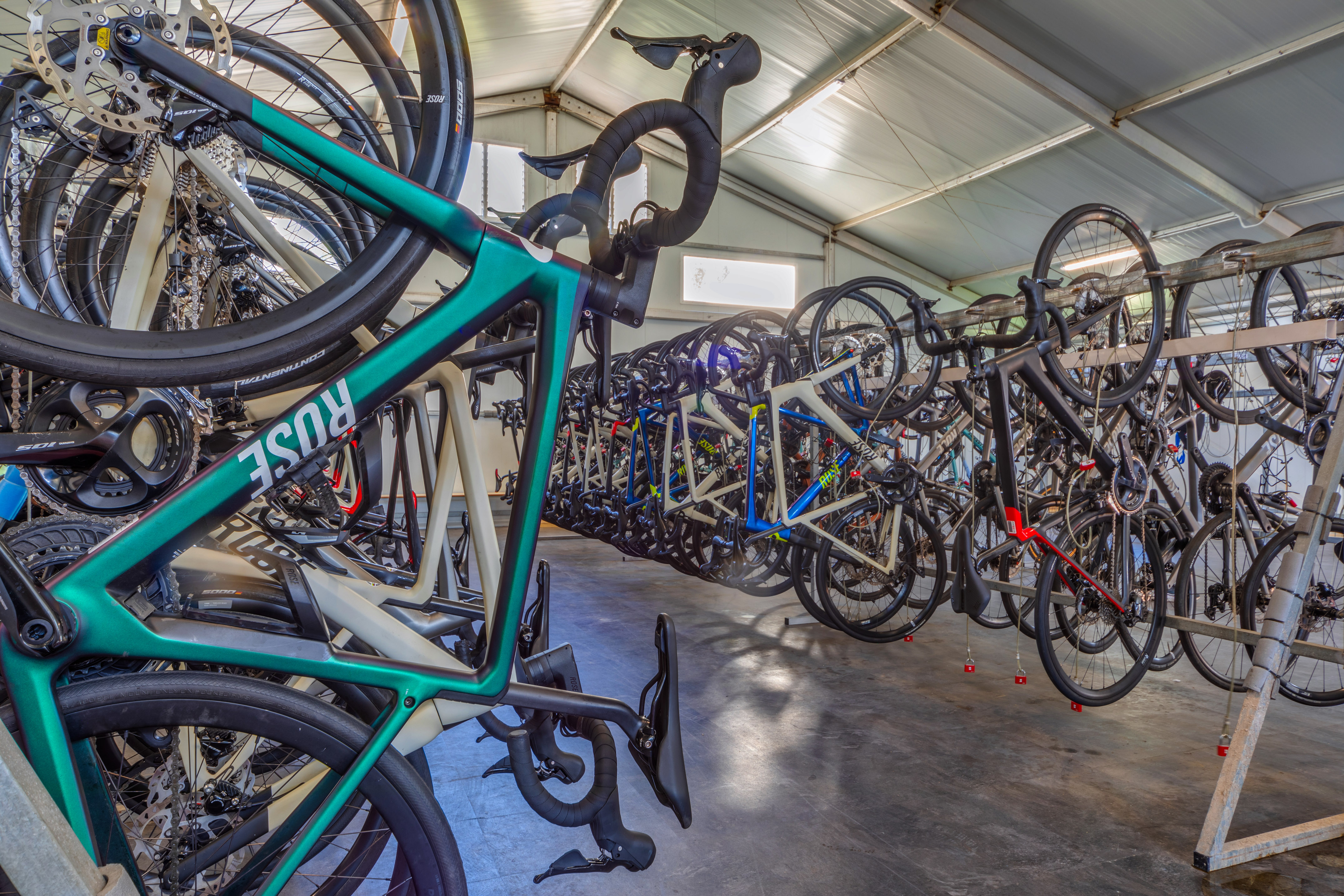 a group of bicycles in a garage