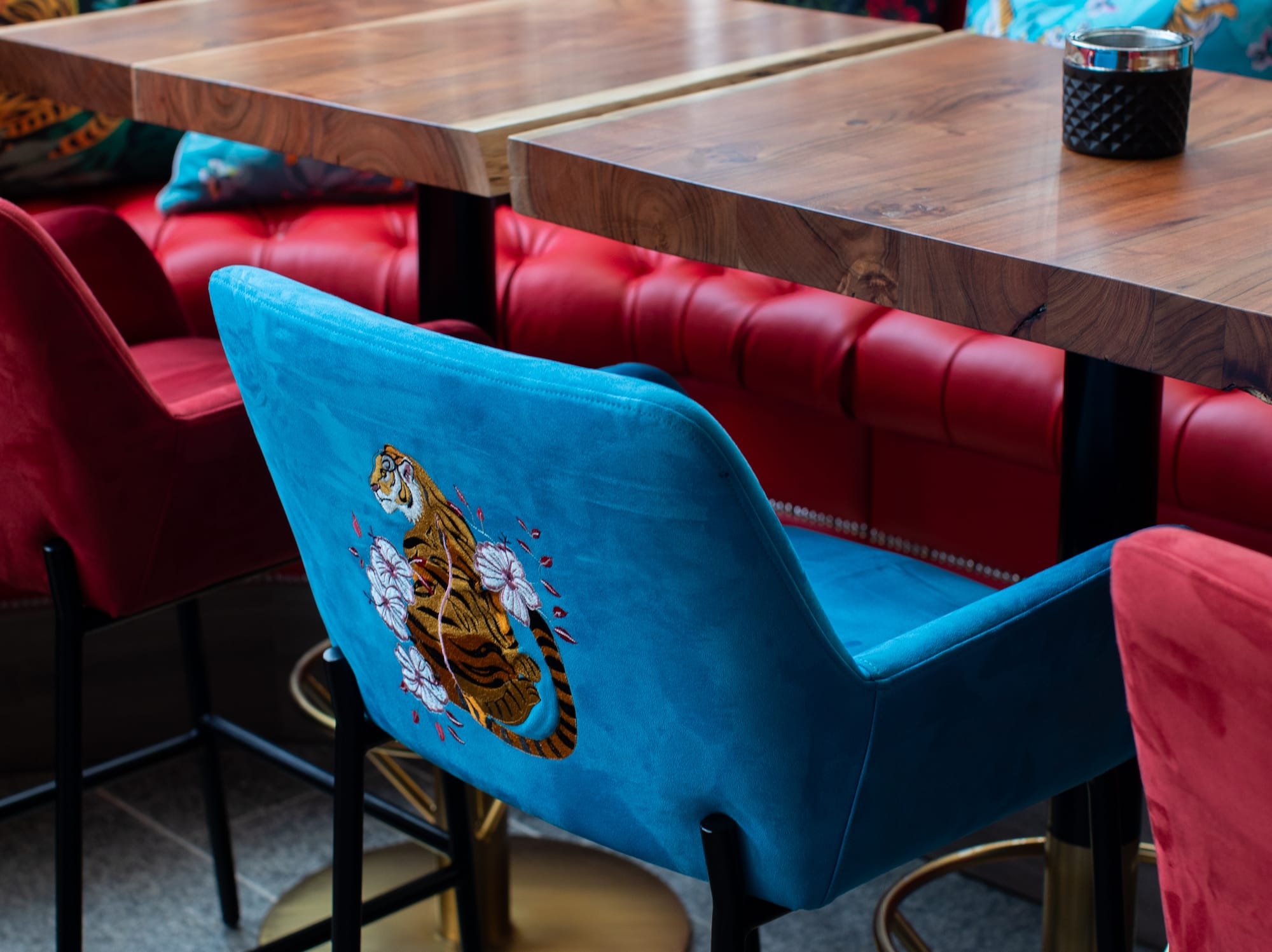 a table with chairs and a candle on it