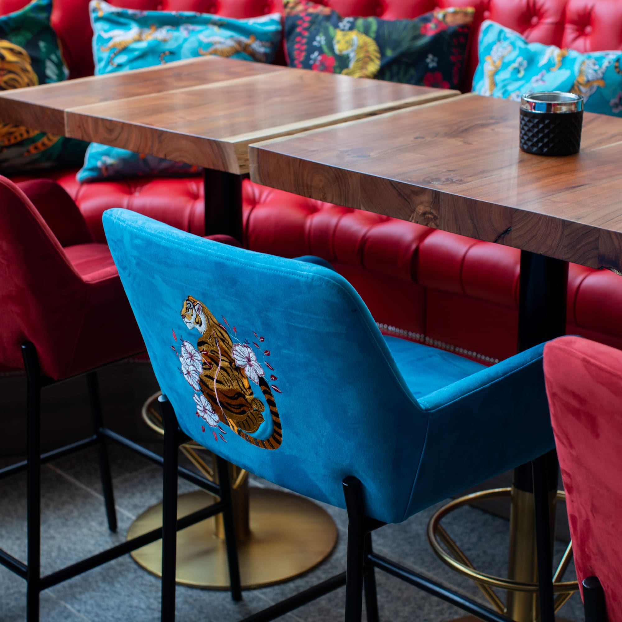 a table with chairs and a candle on it