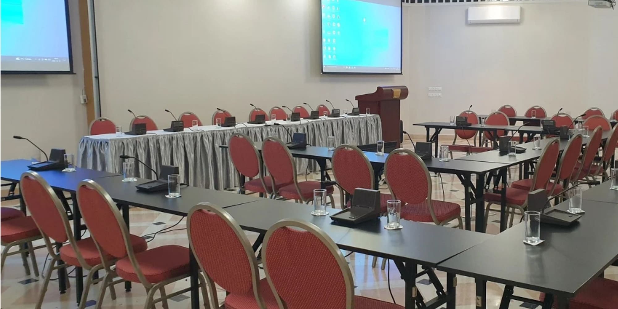 a room with tables and chairs