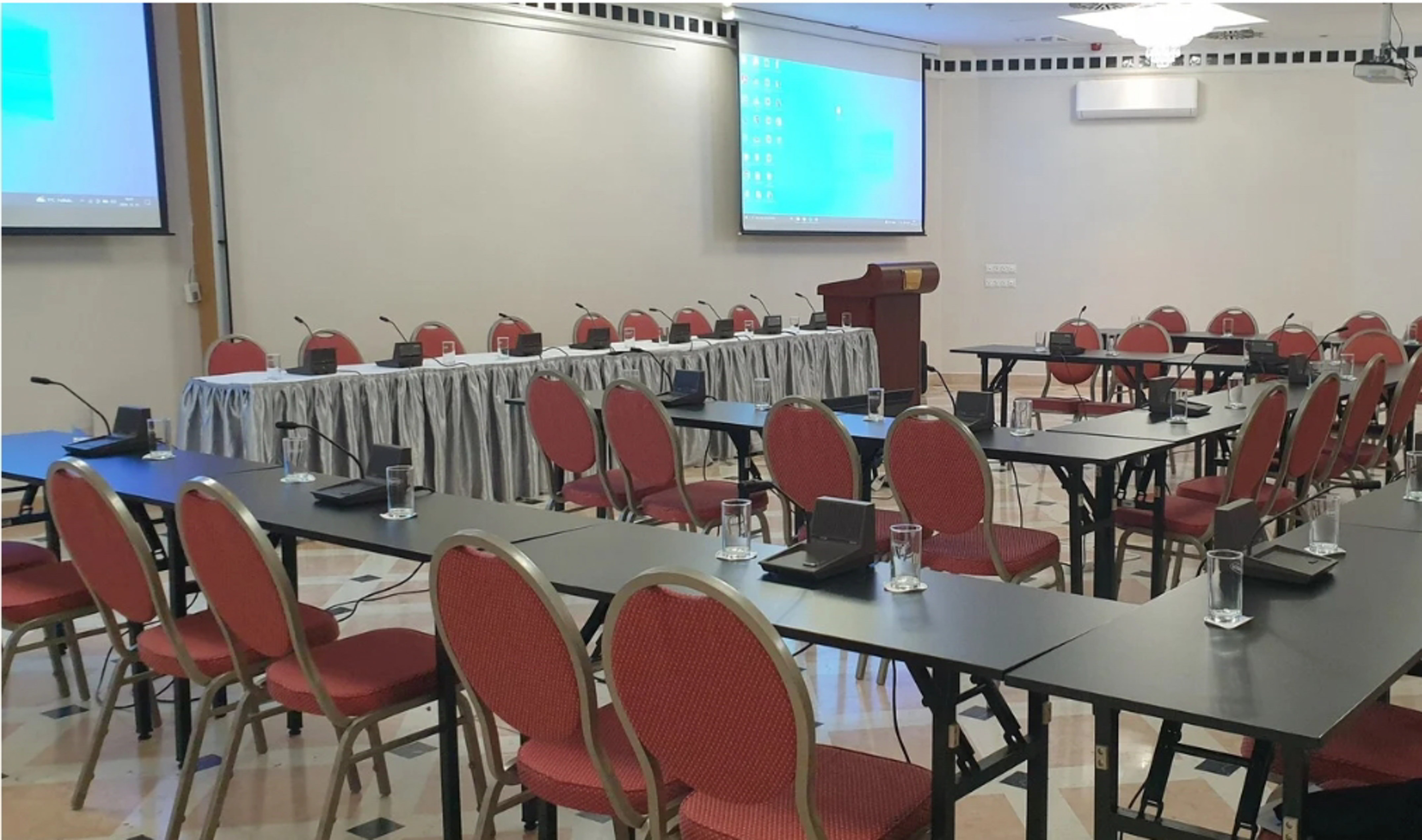a room with tables and chairs