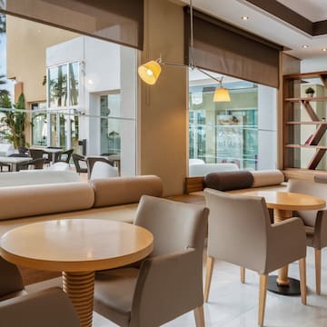 a room with tables and chairs