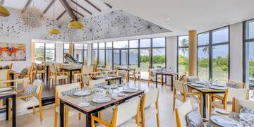 a room with tables and chairs