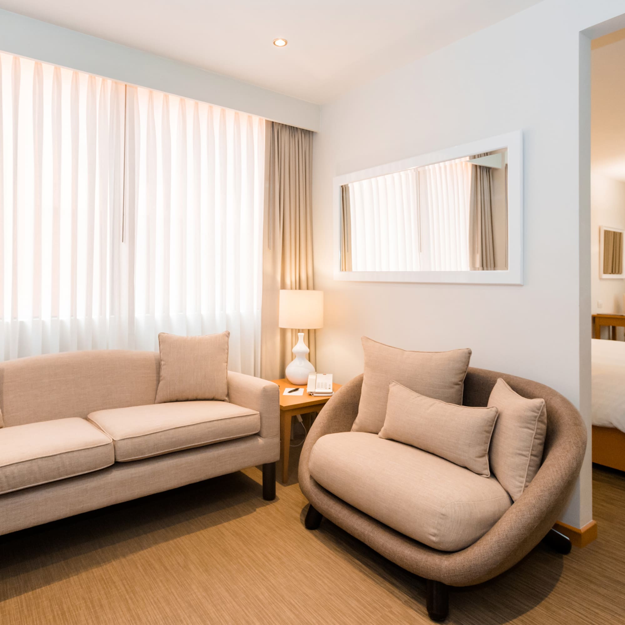 a room with a couch and a bed