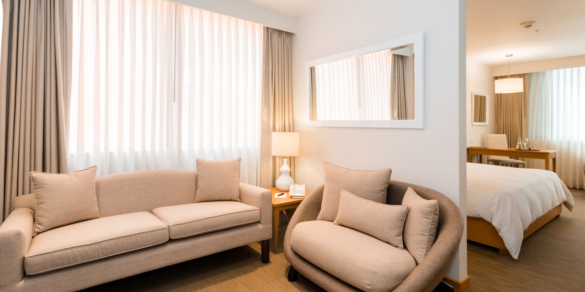 a room with a couch and a bed